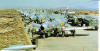 F-86 Sabres with their 51st Fighter Interceptor Wing "Checkertails" are readied for combat during the Korean War at Suwon Air Base, South Korea. (Courtesy photo)